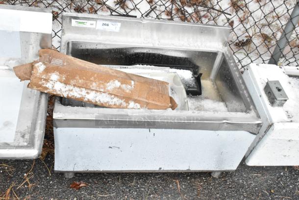 Regency 21" x 30" underbar ice bin with 7 circuit cold plate, visible scratch and dent, includes bottle holders, NSF sticker present.