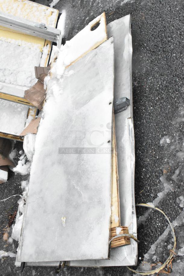 Walk-in box panels with compressor, covered in snow. LCA672AB 115V, 1 Phase evaporator fan included. Used condition.