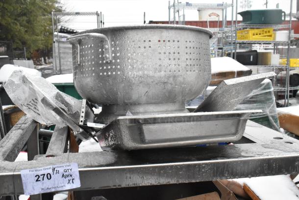 Metal colander, drop-in bin, and pan rack on a shelf. Items include visible wear, auction tag number 270 displayed.