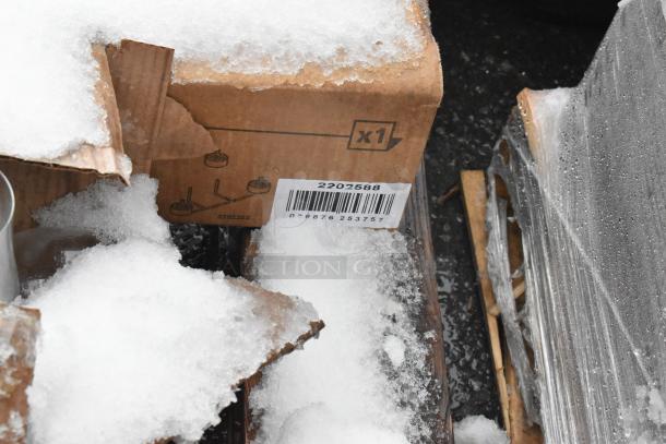 Cardboard box labeled "2202588" under snow, containing Rubbermaid® bumper kit for housekeeping carts.