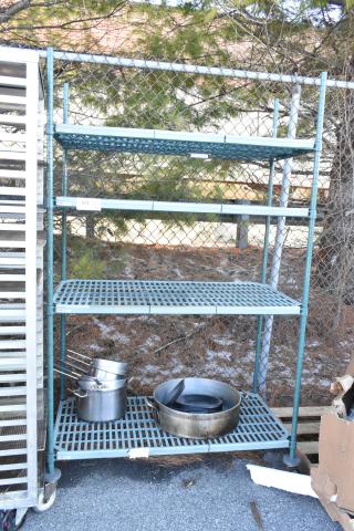 Metro Max 4 tier shelving unit with poly and metal construction. Buyer must dismantle. Consider freight charges.