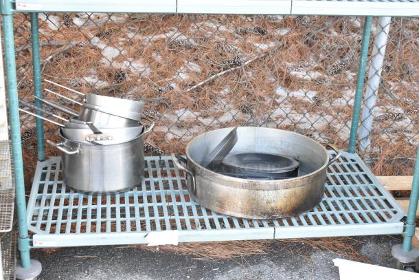 Metro Max Poly and Metal 4-Tier Shelving Unit with kitchenware. Used condition. Buyer must dismantle for shipping.