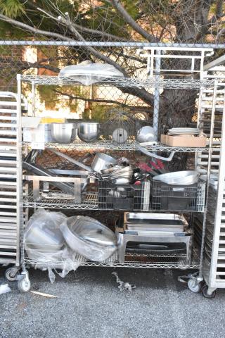 Chrome finish 4-tier wire shelving unit with chafer, mixing bowls, whisk attachments, and skillets. Buyer must dismantle.