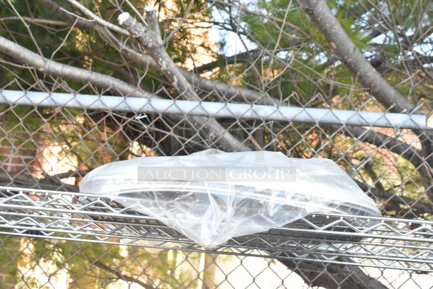 Chrome 4-tier wire shelving with cooking items, including chafer, bowls, whisks, and skillets. Buyer must dismantle.