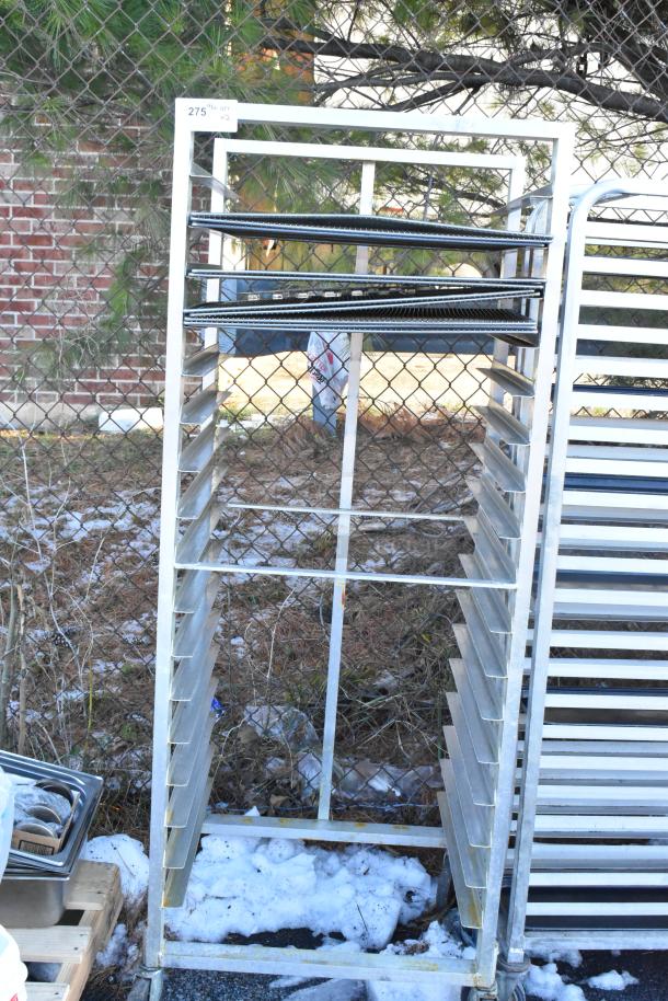 2 Metal commercial pan transport racks with multiple shelves on heavy-duty casters, ideal for kitchens.