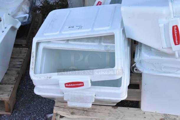 9 items including 4 Rubbermaid white poly ingredient bins, visible wear, labeled, on wooden pallets.