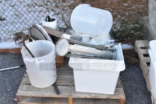 11 various items including poly bins and a chafer lid on a pallet. Items are in used condition with visible markings.