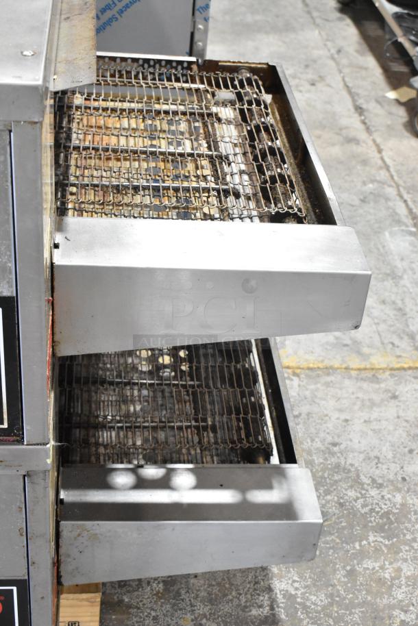 Middleby Marshall CTX DZ33I stainless steel conveyor pizza ovens with casters, 208V, 3/1 phase, used condition.