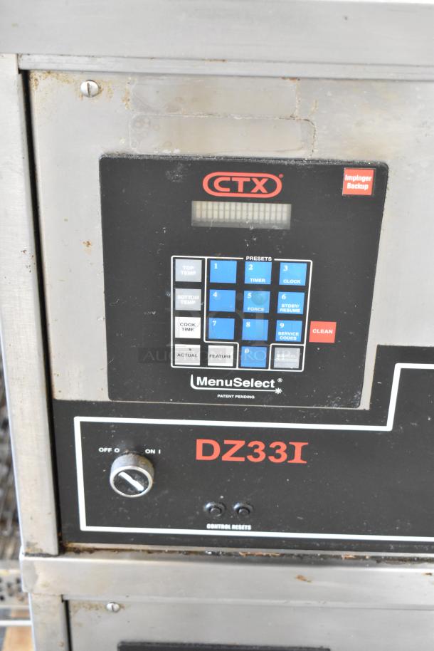 2 Middleby Marshall CTX DZ33I pizza ovens, stainless steel, electric, controls visible. 208V, on commercial casters.