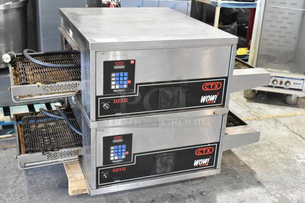 2 Middleby Marshall CTX DZ33I stainless steel conveyor pizza ovens, commercial casters, electric, 208V, 3/1 phase.