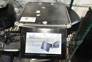 2017 Hobart HTi-7LH26 metal countertop scale with label printer, no power cord, tested working, 120/208-240V, 1 phase.