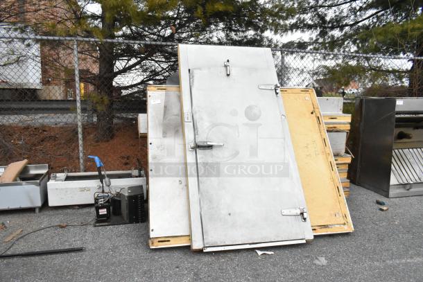 6'x10'x7' walk-in box with compressor and LCA672AB 115V, 1-phase evaporator fan. Components stacked outdoors.