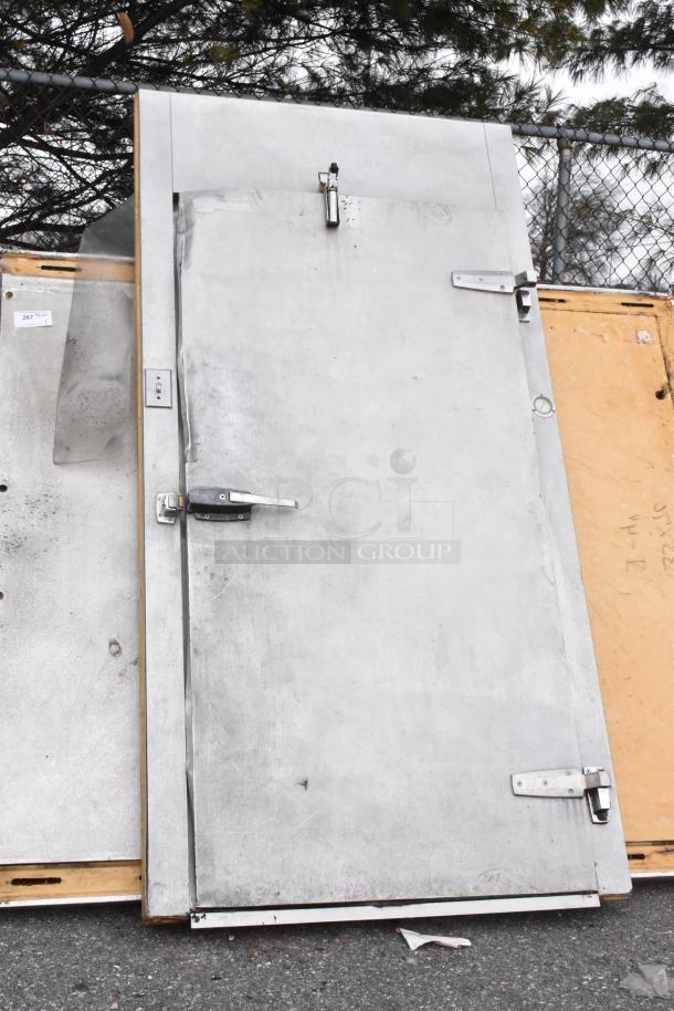 6'x10'x7' walk-in box door, visible handle and hinges, includes compressor and LCA672AB evaporator fan, unverified condition.