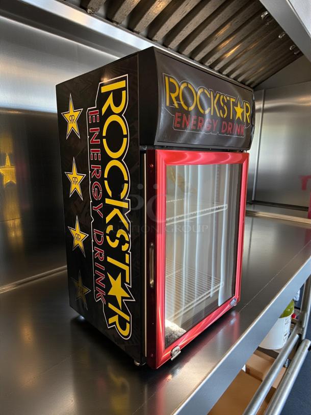 Crystal Cooler CTM-32W countertop glass door refrigerator, great condition, Rockstar Energy Drink branding, tested working.