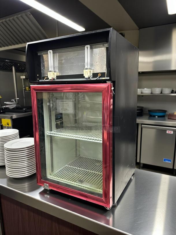 Crystal Cooler CTM-32W countertop glass door refrigerator in great condition, tested and working, with two interior shelves.