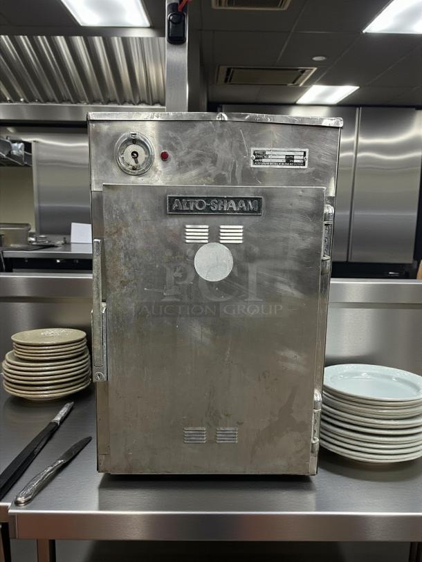 Alto-Shaam 500-S mobile holding cabinet, stainless steel, accommodates 6 pans, tested and working, 120V, in good condition.