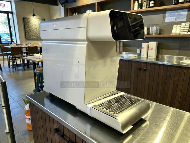 Marco MilkPal Automatic Milk Dispenser, tested and working, in excellent condition. Features sleek design, metallic accents.