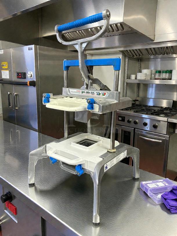 Prince Castle 980-000-00 Saber King manual food slicer, excellent condition, stainless steel. Features blue handle, sharp blades.