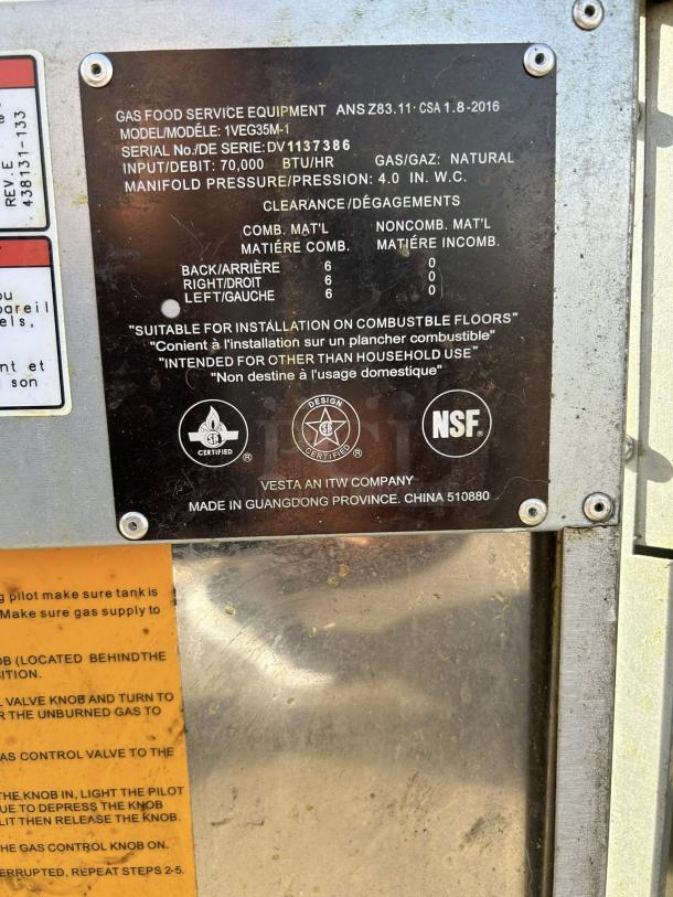 Vulcan 1VEG35M-1 floor fryer label with specs; natural gas, 70,000 BTU. Made in Guangdong, China. NSF certified.