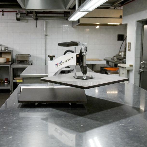 DoughXpress TXM-15CP manual meat press in great condition, labeled "Little Chick," tested and working, on a stainless steel countertop.