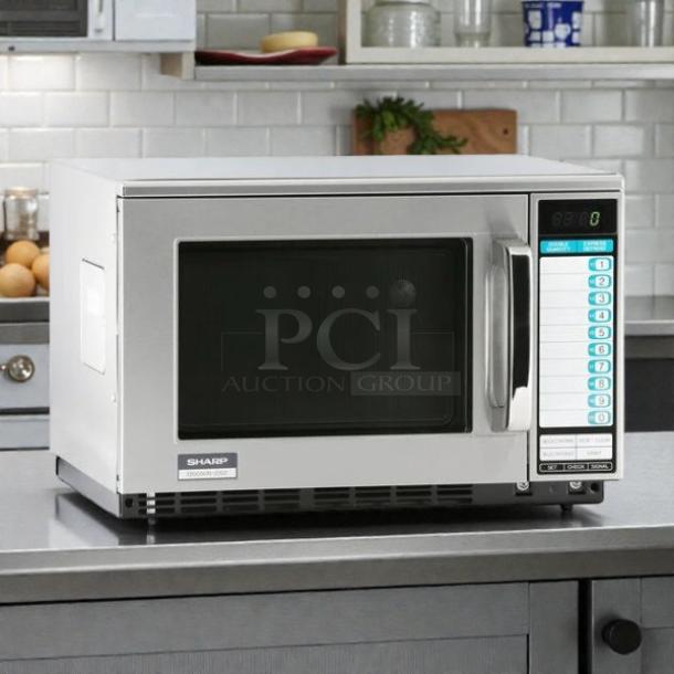 Sharp R22GTF stainless steel commercial microwave, 1,200W, touch controls, 20 programmable memories, tested, working.