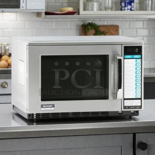 Sharp R22GTF stainless steel commercial microwave, 1,200W, touch controls, 20 programmable memories, tested, working.