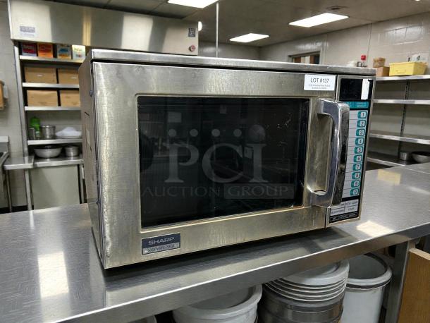 Sharp R22GTF stainless steel commercial microwave, 1,200W, touch controls, 20 programmable memories, tested working condition.