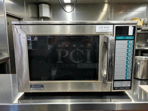 Sharp R22GTF stainless steel commercial microwave, 1,200W, touch controls, 20 programmable memories, tested, working.