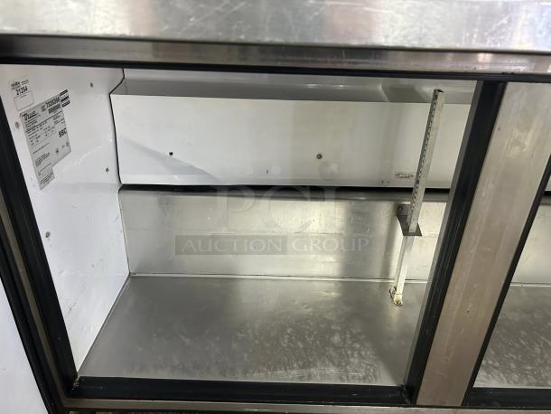 True TSSU-60-24M-B-ST-HC 60" Mega Top Sandwich/Salad Prep Table in excellent condition with refrigerated base.