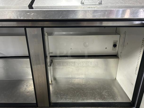 True TSSU Series 60" sandwich/salad prep table; stainless steel, refrigerated base, tested and working. Excellent condition.