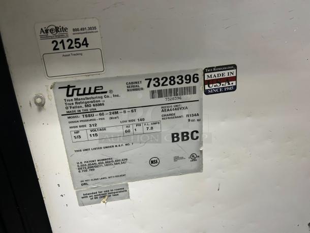 True TSSU-60-24M-B-ST-HC prep table label, excellent condition, 115V, model details and serial number visible, Made in USA.