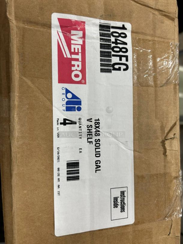 Brand new Metro 1848FG 18" x 48" solid galvanized shelf in box. Label indicates model, quantity, and instructions inside.