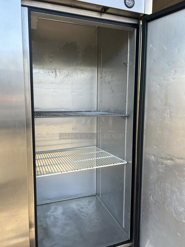 True TS-72-HC refrigerator, three solid doors, reach-in, stainless steel, excellent condition, 115v, tested and functional.