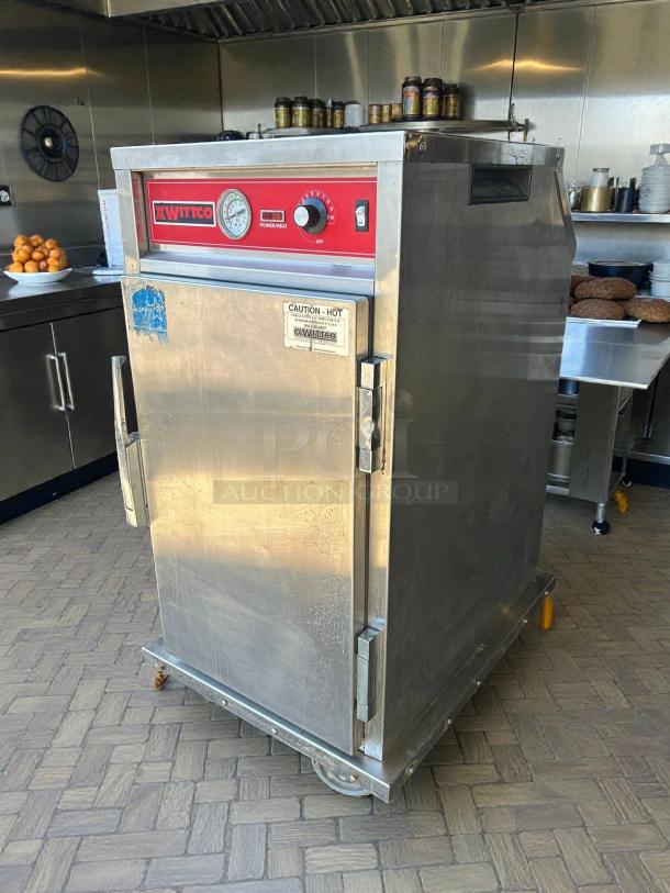 Wittco 1826-5 heated holding cabinet, half-height, mobile, stainless steel, tested and working, visible caution and brand labels.