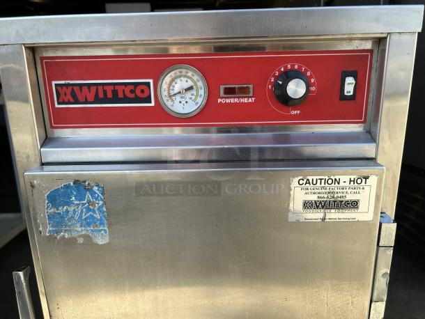 Wittco 1826-5 heated holding cabinet, half-height, stainless steel, control panel with red label, marked "Caution - Hot."