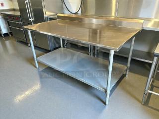 Eagle Group T3084SB-X stainless steel worktop table with 2" backsplash, galvanized bottom shelf, great condition.