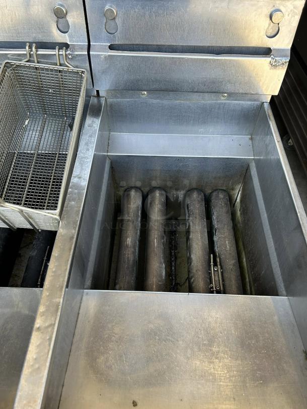 Pitco SG14-2FD Solstice gas fryer in excellent condition, featuring 2 vats and 50 lb. capacity, tested and working.