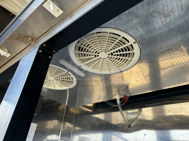 Kool-It KBSF-2 reach-in freezer interior, showing dual fans and wiring. Stainless steel finish, model tested and working.
