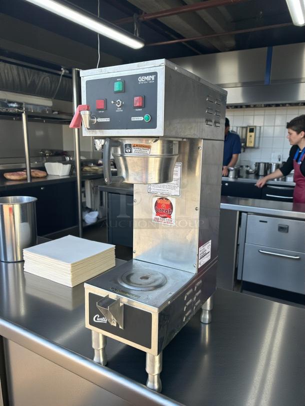 Curtis GEM-120A-10 automatic coffee brewer, 9-inch, 1-gallon capacity, stainless steel, tested, working condition, visible labels.