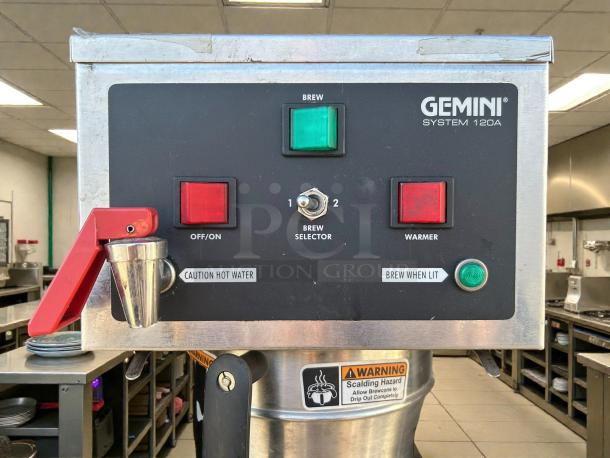 Curtis GEM-120A-10 automatic coffee brewer, 9-inch width, 1-gallon capacity. Features brew selector and warmer. Tested and working.