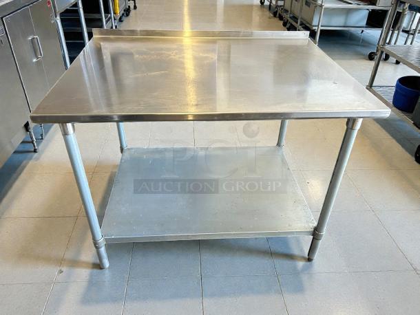 GSW USA stainless steel 48” worktop table, model ES-P3048W, with galvanized bottom shelf in great condition.