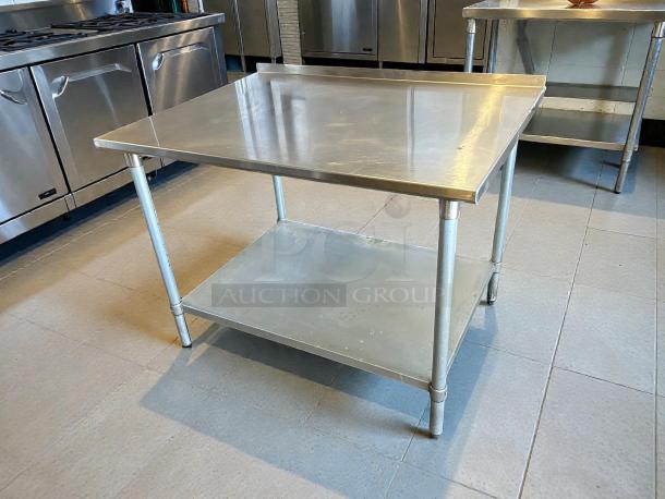 GSW USA 48" stainless steel worktop table, model ES-P3048W. Features galvanized bottom shelf. Great condition.