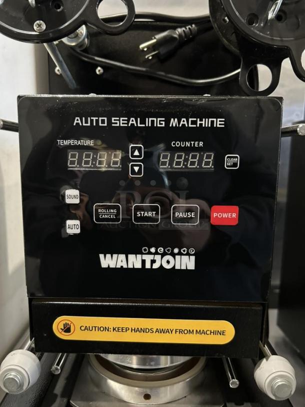 WANTJOIN WZ-95B cup sealing machine, 110-120V, auto sealing features, digital display, tested working, caution label visible.