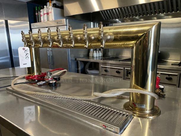 MicroMatic MBB-94-E kegerator, 3-door, 95.5" brass taps, tested and working, tag marked "BRD", kitchen setting.