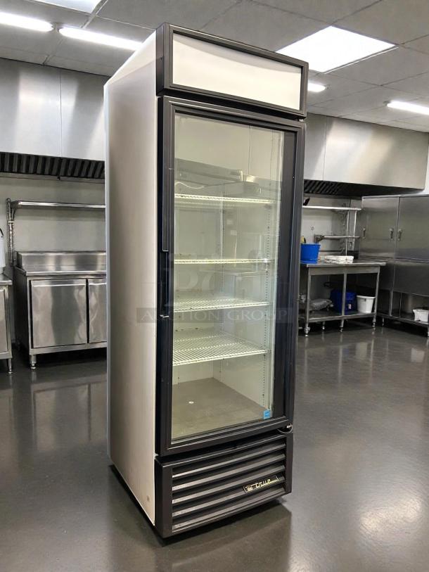 True GDM-23-HC~TSL01 glass door merchandiser, black, 27", right hinge door. Excellent condition, tested, working, 115v.