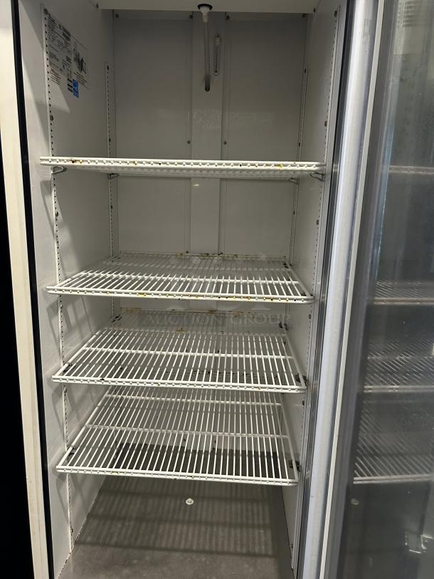 True GDM-23-HC~TSL01 glass door merchandiser, black, excellent condition, 27" size, four shelves, right hinge door, 115v.