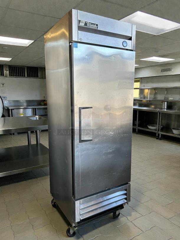 True TS-23F-HC commercial freezer, 23 cu. ft., stainless steel, single solid door, tested and working, on wheels.