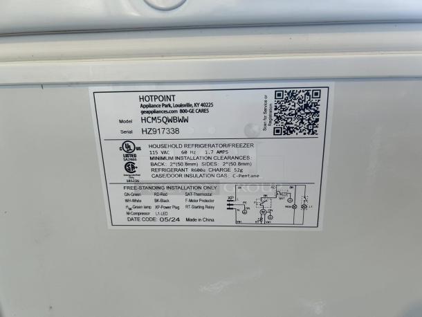 Hotpoint chest freezer/refrigerator, model HCM5QWWW, 4.9-cu ft, white, excellent condition, tested, label shows technical specs.