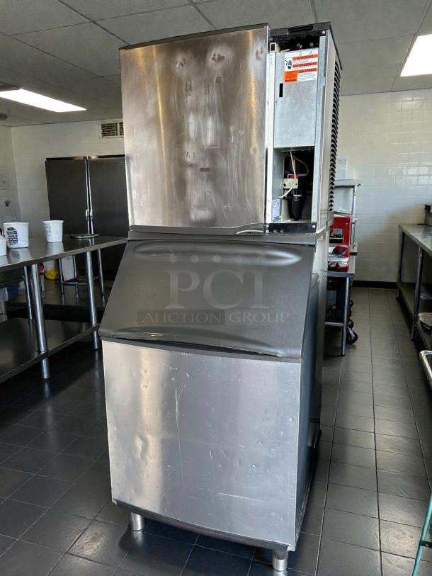 Manitowoc SY0854A ice maker, excellent condition, air-cooled, tested and working, stainless steel exterior, visible control panel.