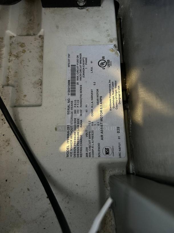 Label on Manitowoc Ice IY-0906A Indigo™ Half Cube Ice Machine showing model, serial number, and specifications.